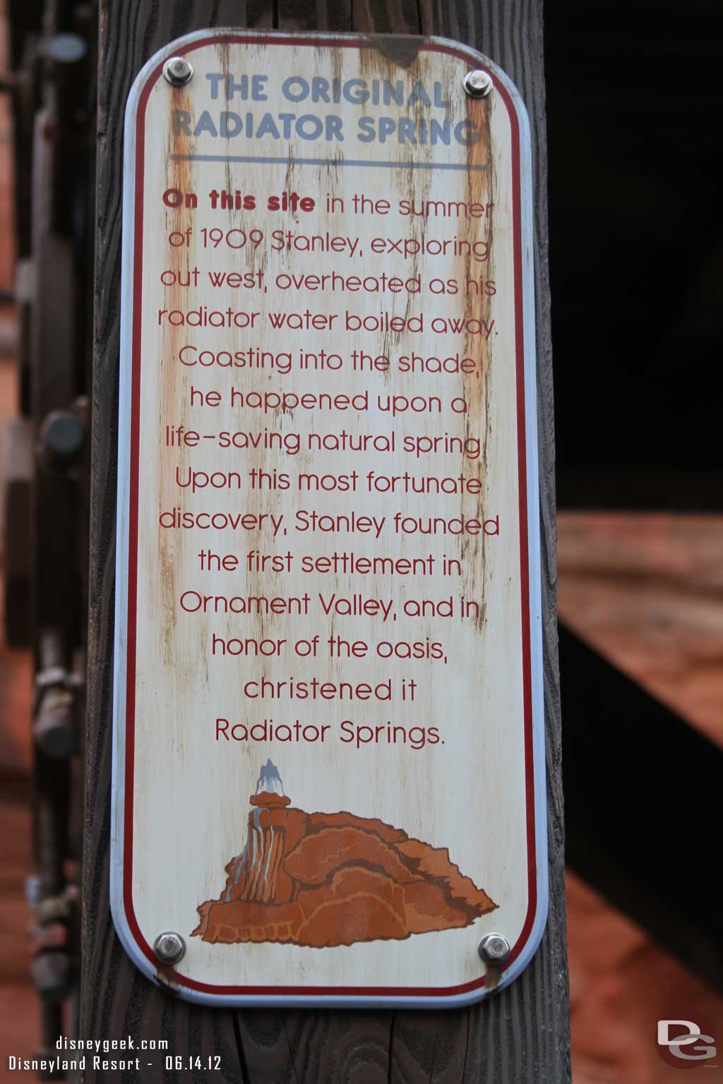 While waiting took some pictures of the signs in the queue.  They tell the story of the origins of Radiator Springs.