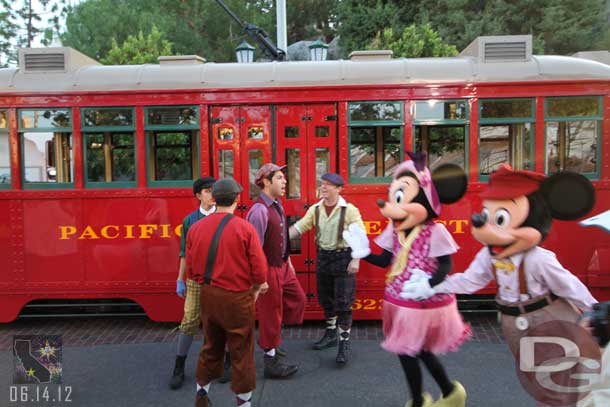 Mickey and Minnie heading off.