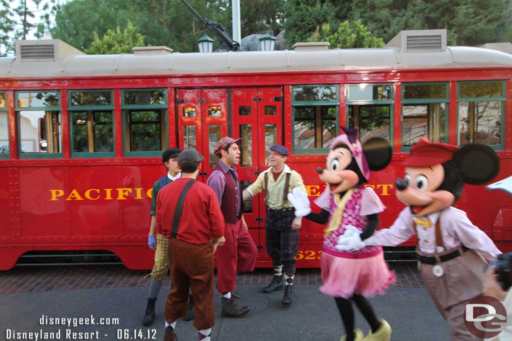 Mickey and Minnie heading off.