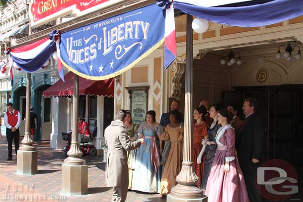 Time for the Voices of Liberty.  They perform a brief song outside then head into the main theater.