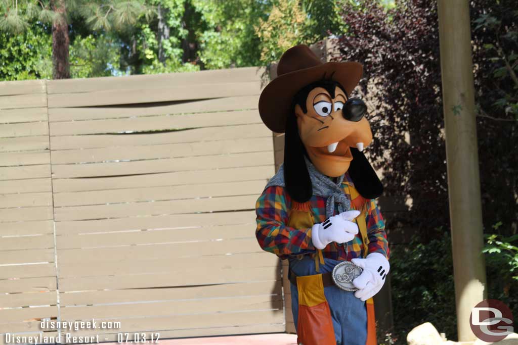 Goofy strolled by and gave me a high five.