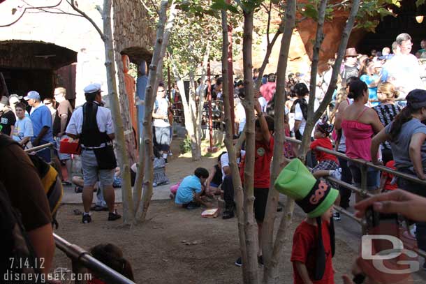 I do not think this was the original intent of this planter/area.  It has turned into a kids play/waiting area as well as a location for the vendors to hawk their treats.