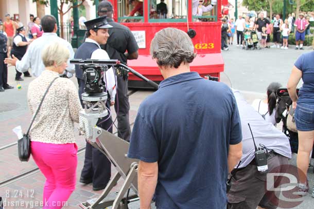 The film crew moved over and out to the street.