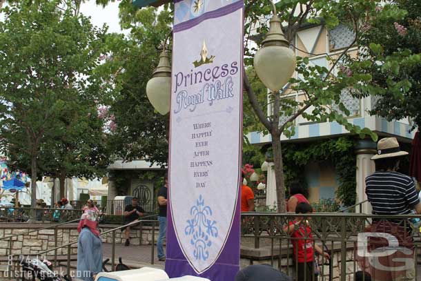 There are some banners and backdrops behind them.  Very similar in concept to what was set up for the Villains the past several years during HalloweenTime.