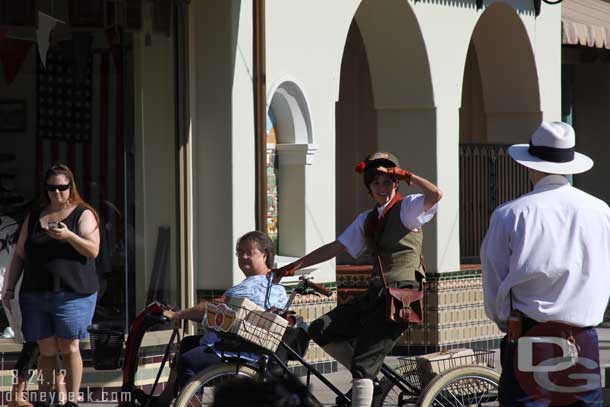 The citizens of Buena Vista Street stop to observe.