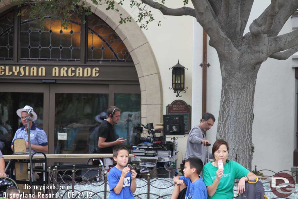 A film crew off to the side.. they were just milling around.