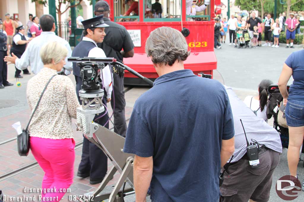 The film crew moved over and out to the street.