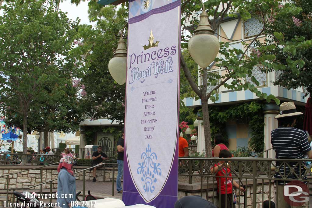 There are some banners and backdrops behind them.  Very similar in concept to what was set up for the Villains the past several years during HalloweenTime.