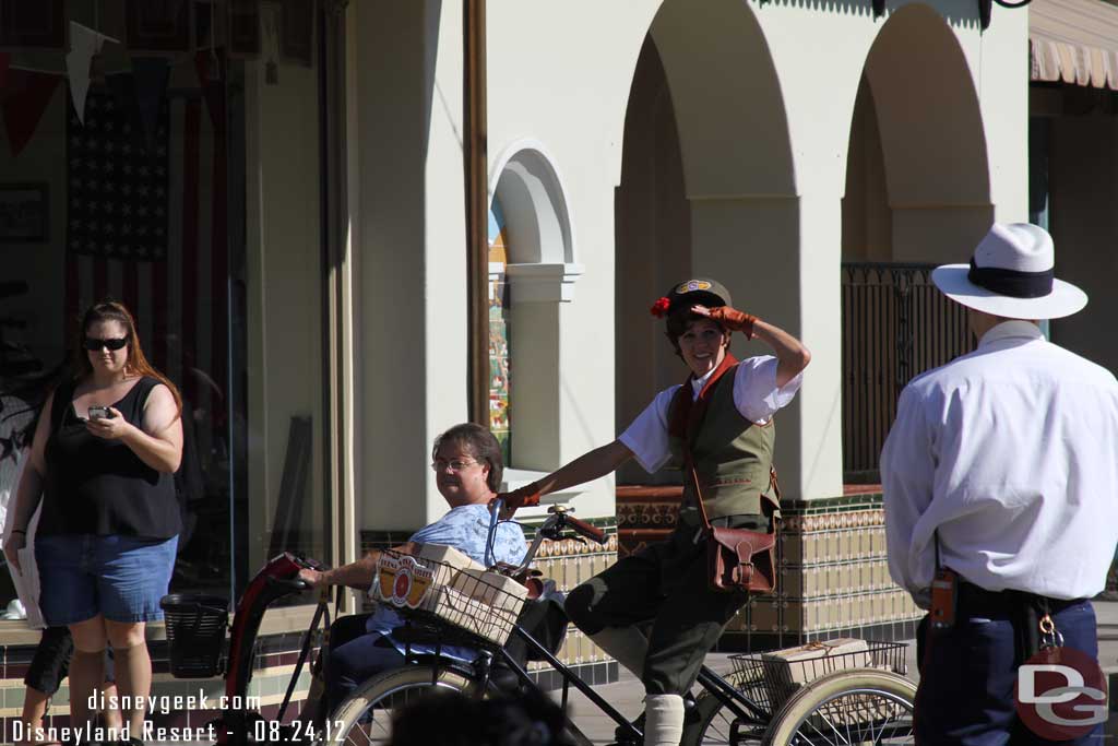 The citizens of Buena Vista Street stop to observe.
