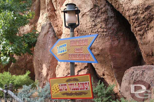 Coming from the Fantasyland side there are the same signs.