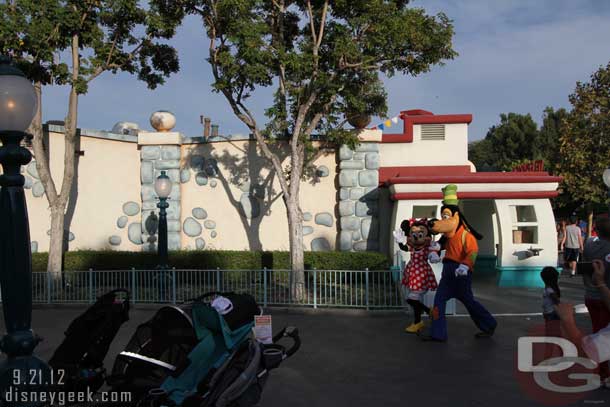 Minnie and Goofy heading backstage.