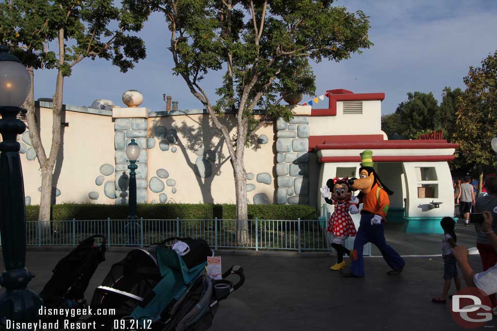 Minnie and Goofy heading backstage.