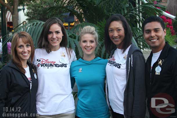 Caroline Sunshine is joined by the two newly named Disneyland Resort Ambassadors Megan Navarette and Sachico White and the current/outgoing two for a photo.