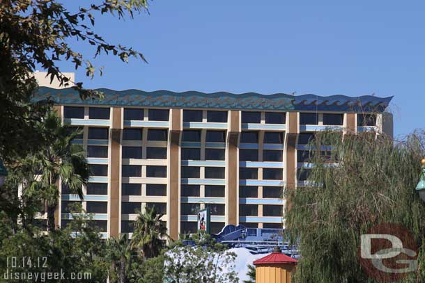 The Paradise Pier Hotel is being repainted.  The new color is on the far right.