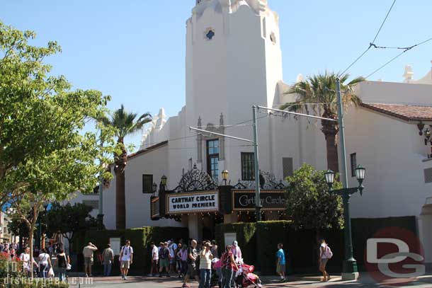 There are hedges forming a construction wall around the sides of the Carthay entrance as they redo the walkway.