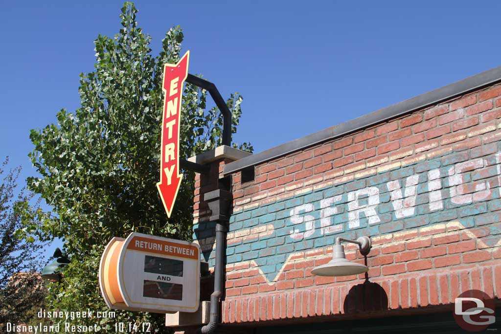 The neon sign for Fastpass distribution has been removed, but the return time sign has stayed.