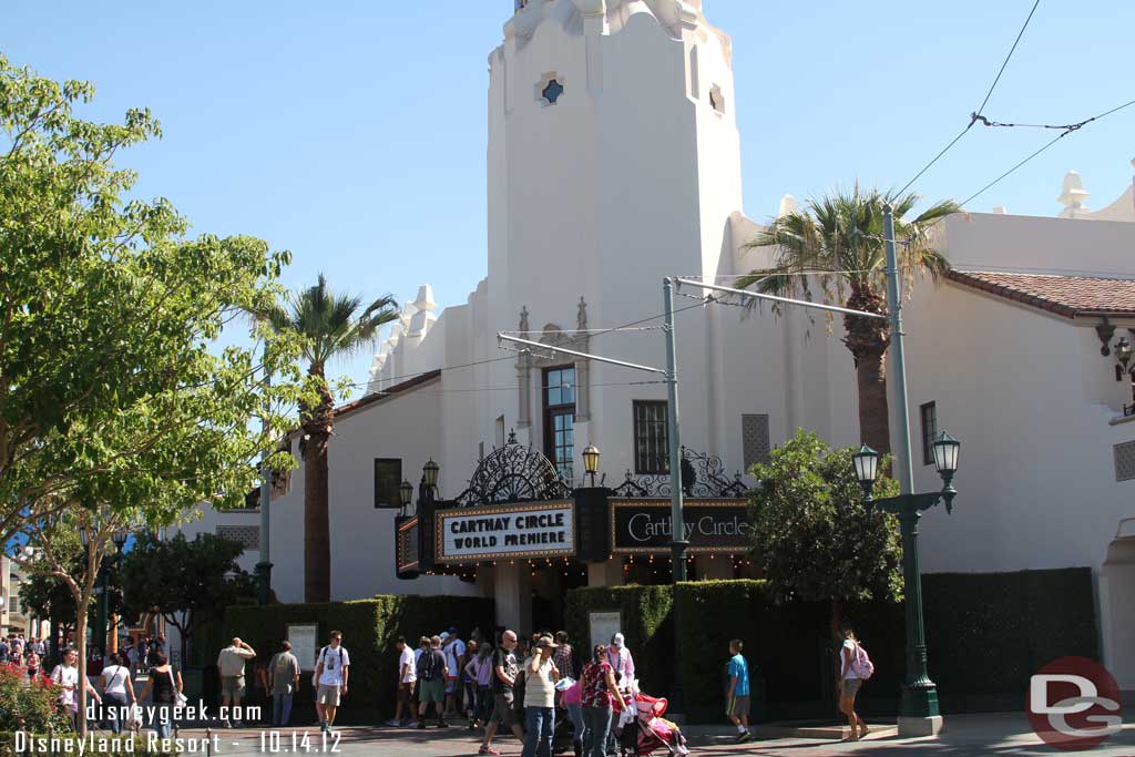 There are hedges forming a construction wall around the sides of the Carthay entrance as they redo the walkway.