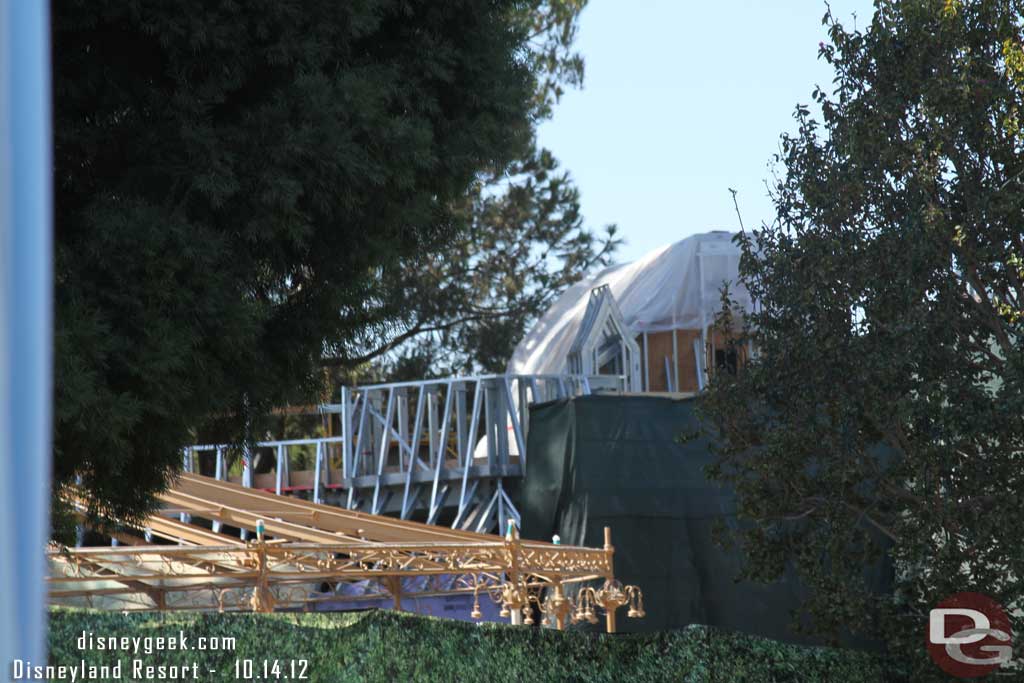 More of the structure is going up, but hard to make out with the trees and scaffolding.