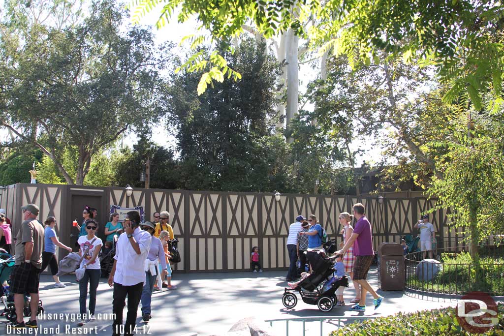 Walls have been set up around the restrooms near the Fantasyland Theater.  They are still open though.  Maybe they are working on the pavement?