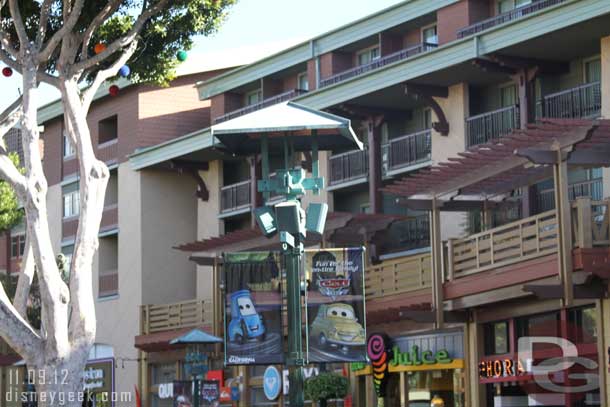 The banners have gone back to the Cars Land ones.  Guessing Christmas will go up next week.