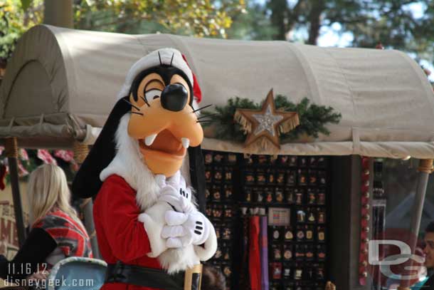 Santa Goofy coming out for pictures during the show.