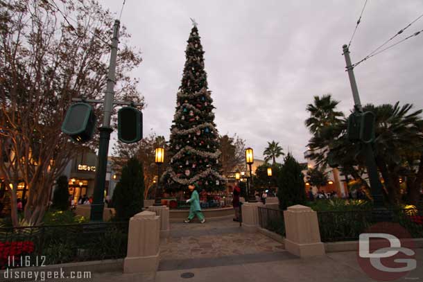 Goofy and Mickey checking out the Christmas tree.