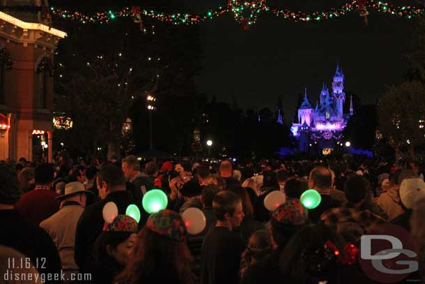 Back to Disneyland for Believe in Holiday Magic, which now features Glow with the Show elements.  So I found some ears to stand behind.  Not many in the audience tonight.