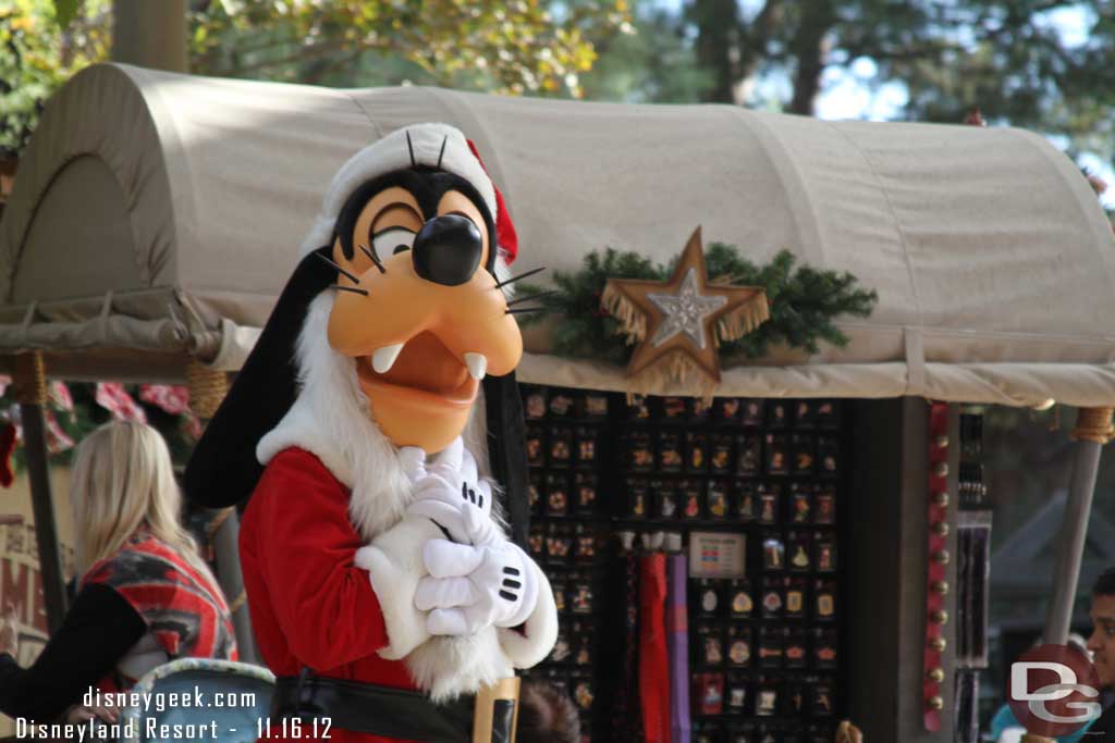 Santa Goofy coming out for pictures during the show.