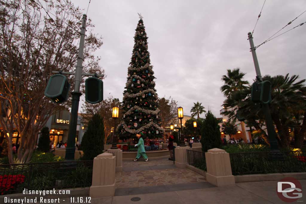 Goofy and Mickey checking out the Christmas tree.