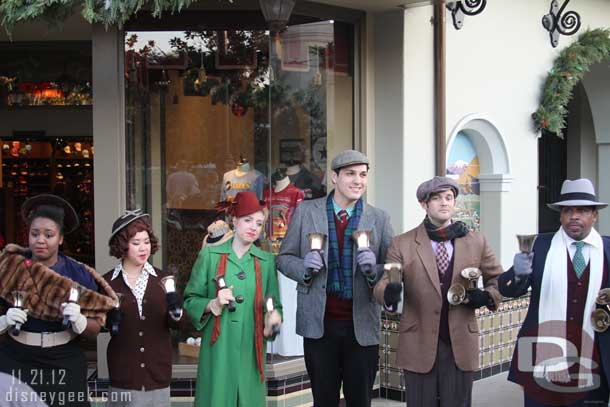 The Community Bell Ringers performing by the Five & Dime.