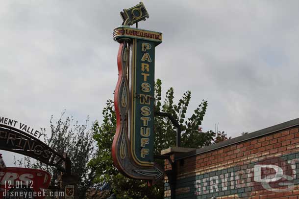 Did not catch it last trip, but the Fastpass sign has been changed to say Parts N Stuff.  Great to see it back and updated.