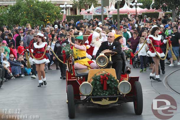 There was a problem with Santas float so he was traveling by fire truck this parade.