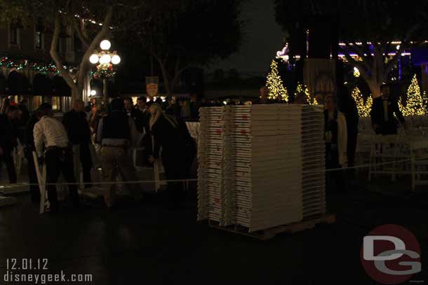 Cast Members were busy stacking the chairs from the Candlelight and clearing the street.