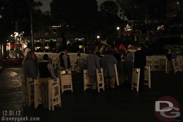 On the City Hall side, plenty of cast members working on stacking the chairs here too.