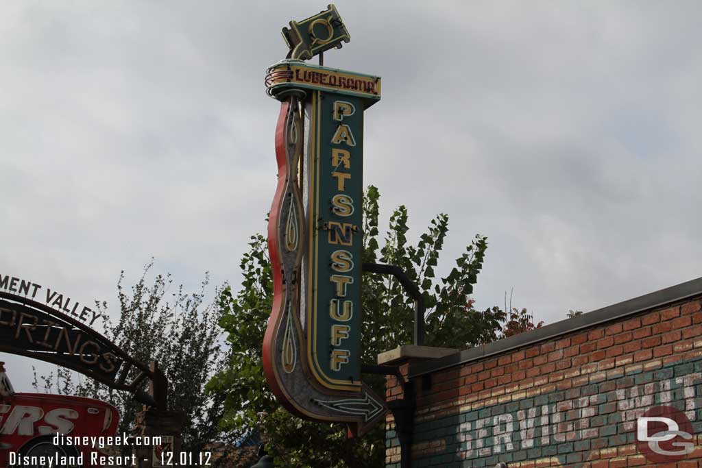 Did not catch it last trip, but the Fastpass sign has been changed to say Parts N Stuff.  Great to see it back and updated.