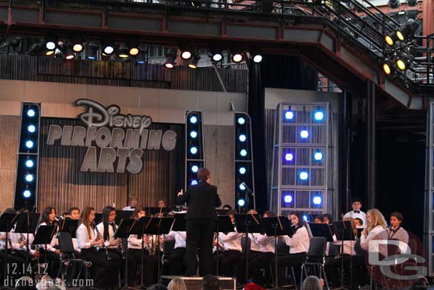 A school band performing on the stage.