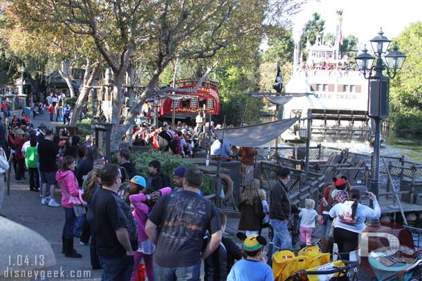 From the peaceful River to the crowds... here you can see the line for Tom Sawyer Island is stretching quite a ways down the walkway.