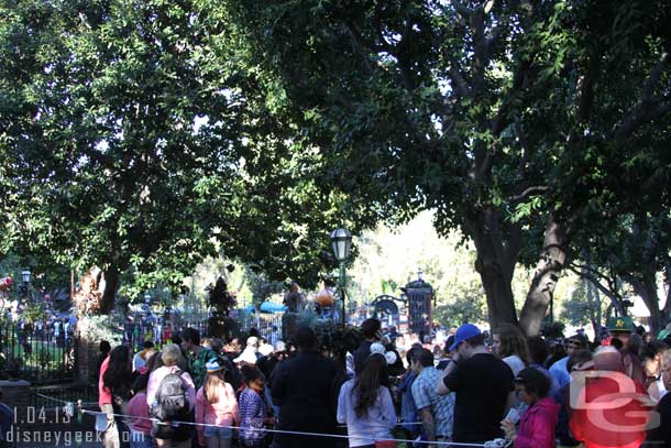 The Haunted Mansion queue filled the walkways and park area near the Mansion.