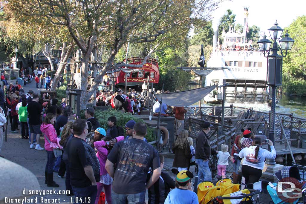 From the peaceful River to the crowds... here you can see the line for Tom Sawyer Island is stretching quite a ways down the walkway.