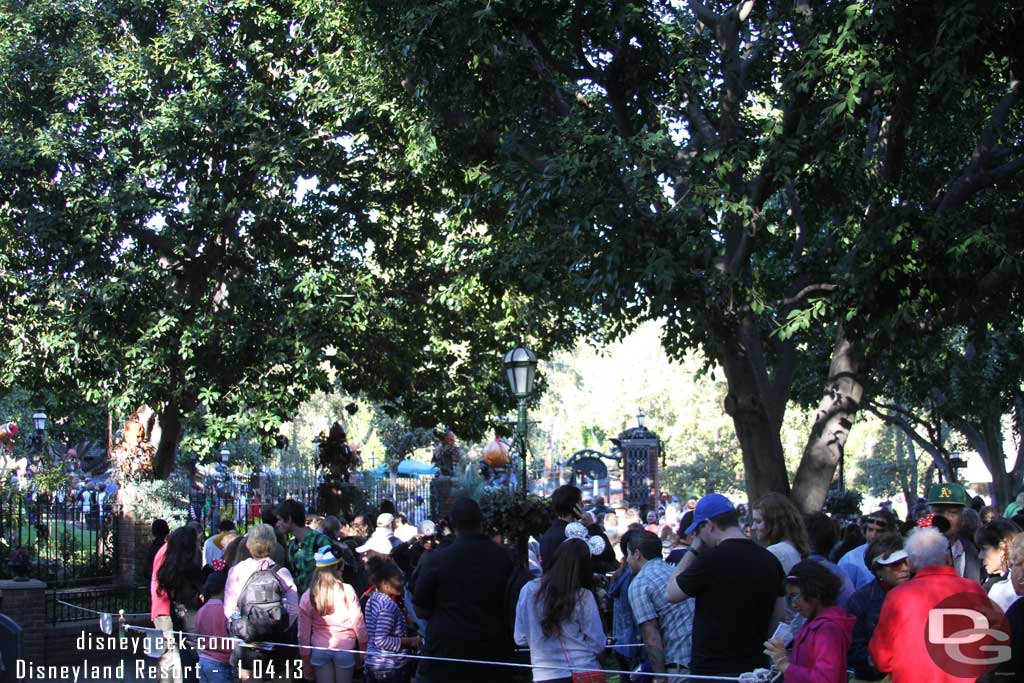 The Haunted Mansion queue filled the walkways and park area near the Mansion.