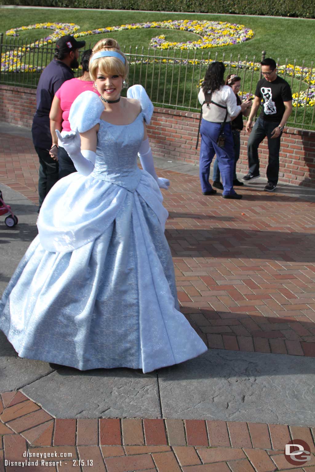 Cinderella out front greeting guests entering the park.