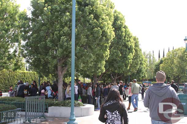 The tram stop had a healthy number of guests waiting and plenty of trams moving around.