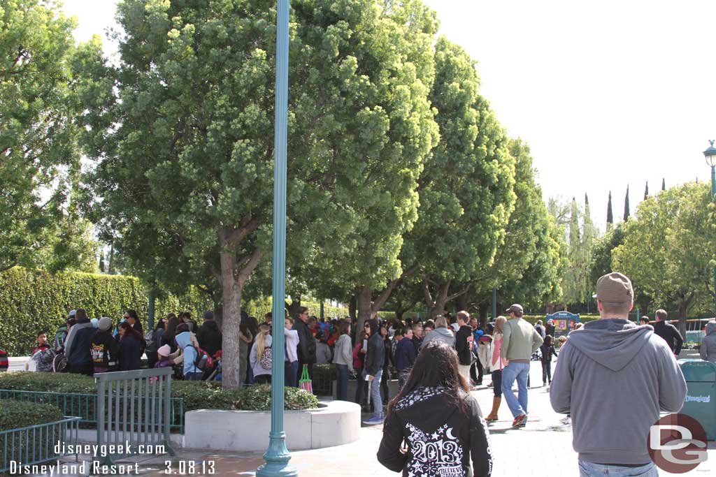 The tram stop had a healthy number of guests waiting and plenty of trams moving around.