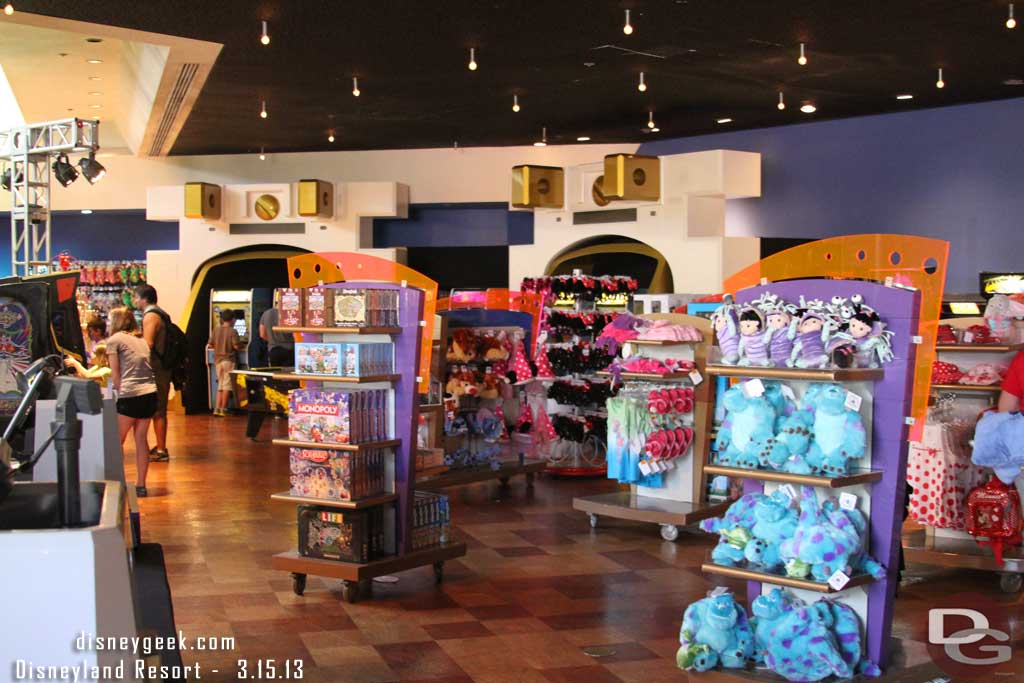 The walls in the Starcade have come down.  The merchandise displays are spread out more and some video games have returned.