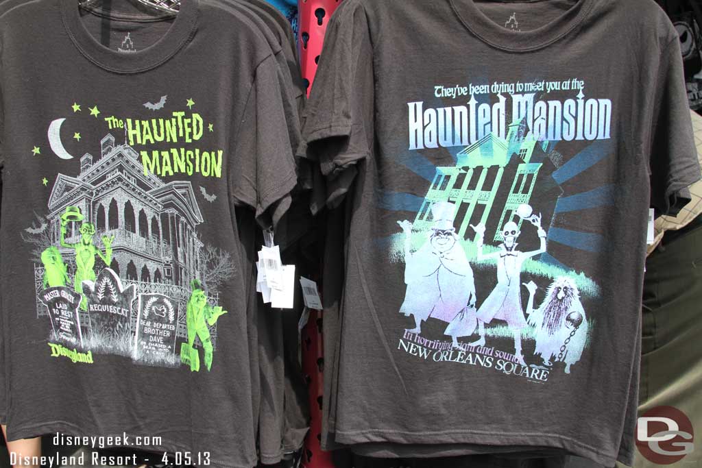 A couple shirts I do not remember seeing before on the cart near the Haunted Mansion.