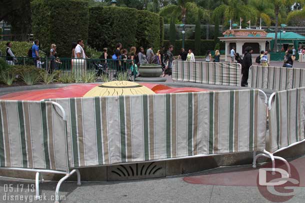 The fountain at the Mickey and Friends Tram stop in Downtown Disney has fences around it.