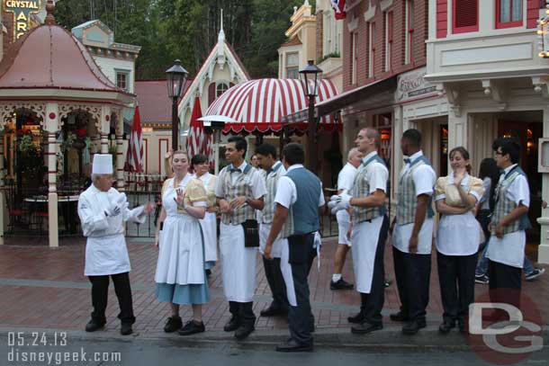 The Carnation Cafe cast members greeting guests.