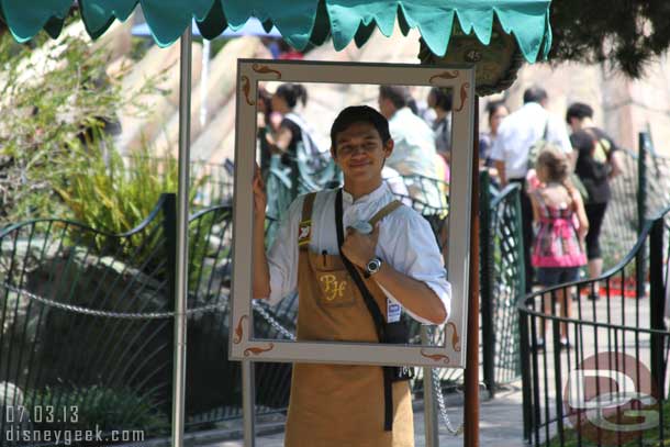 A CM at Pixie Hollow hanging out in a picture frame.