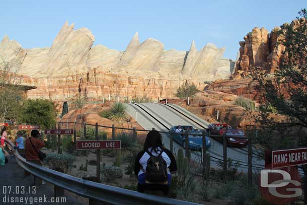 This was something I had not seen.. adults and kids all over the rail along Cross Street.  Why?  Is it that hard to stand up or is the view that much better from a foot closer?  And where are the cast members to get them back on the proper side of the rail?