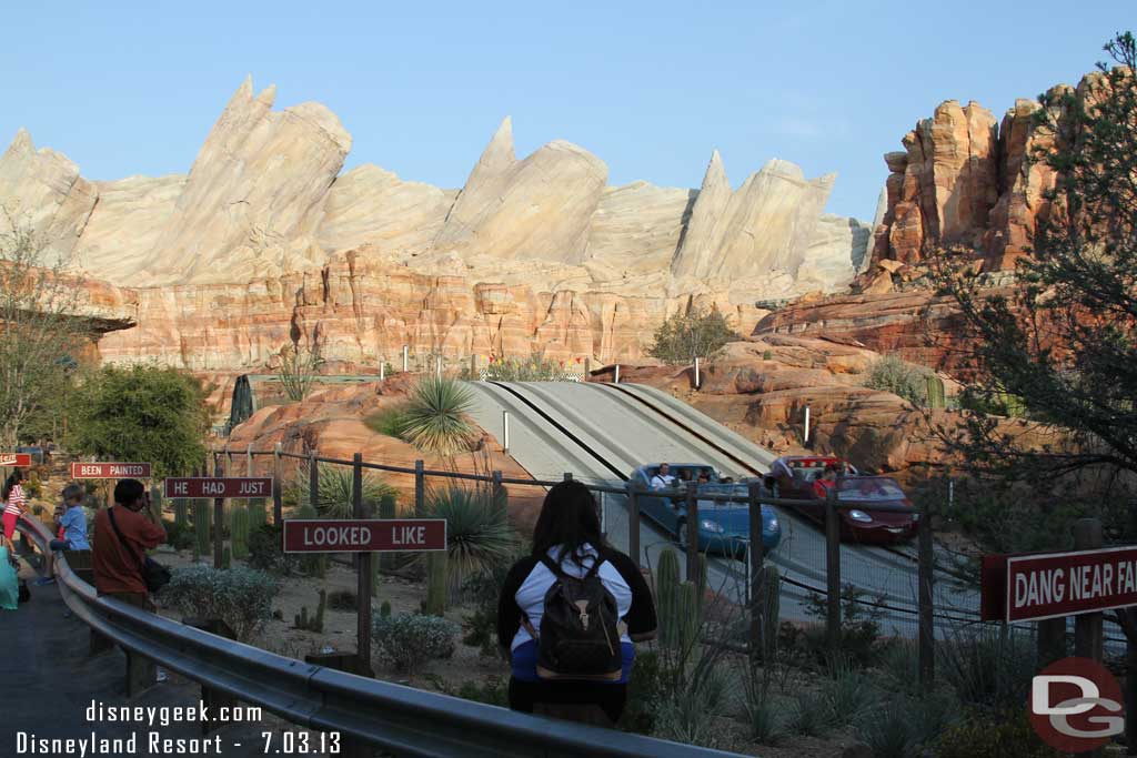 This was something I had not seen.. adults and kids all over the rail along Cross Street.  Why?  Is it that hard to stand up or is the view that much better from a foot closer?  And where are the cast members to get them back on the proper side of the rail?